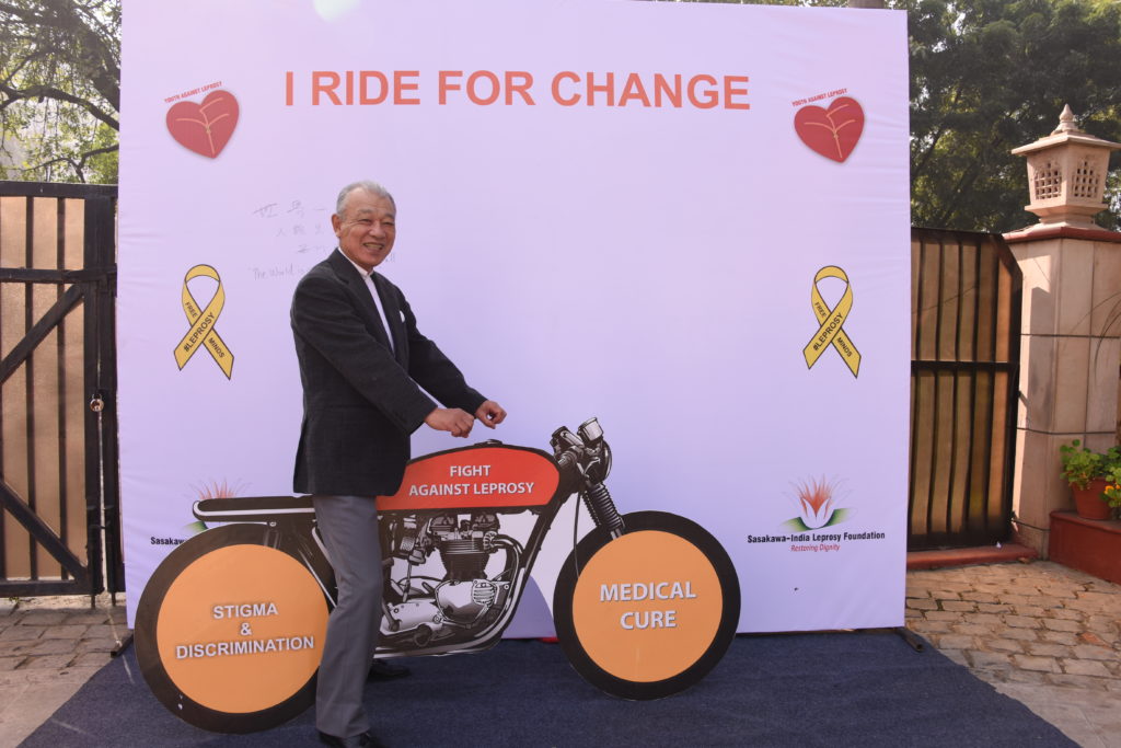 Astride a mockup of the leprosy “motorcycle”.